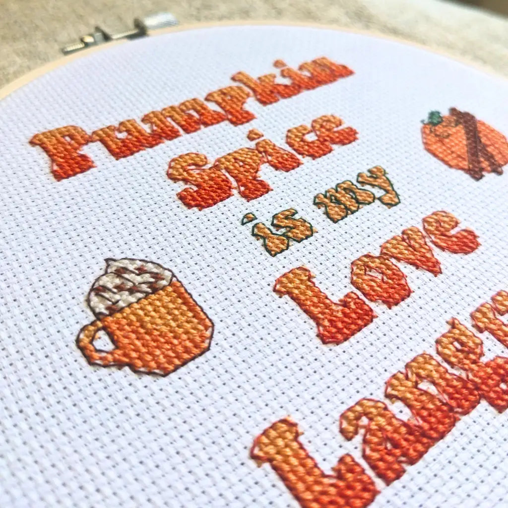 Close up of the completed Pumpkin Spice Lover Cozy Fall Cross Stitch by Room for Calm