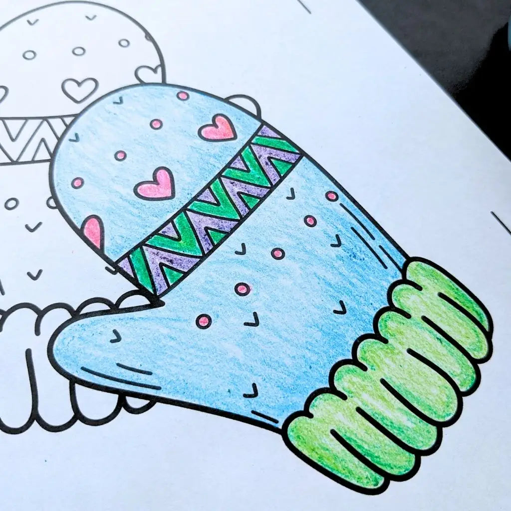 Partially completed coloring page of a cozy mitten with stripes and hearts from Room for Calm
