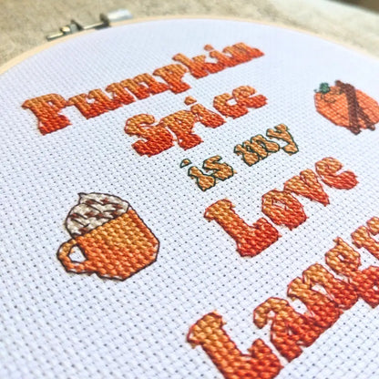 Close up of the completed Pumpkin Spice Lover Cozy Fall Cross Stitch by Room for Calm